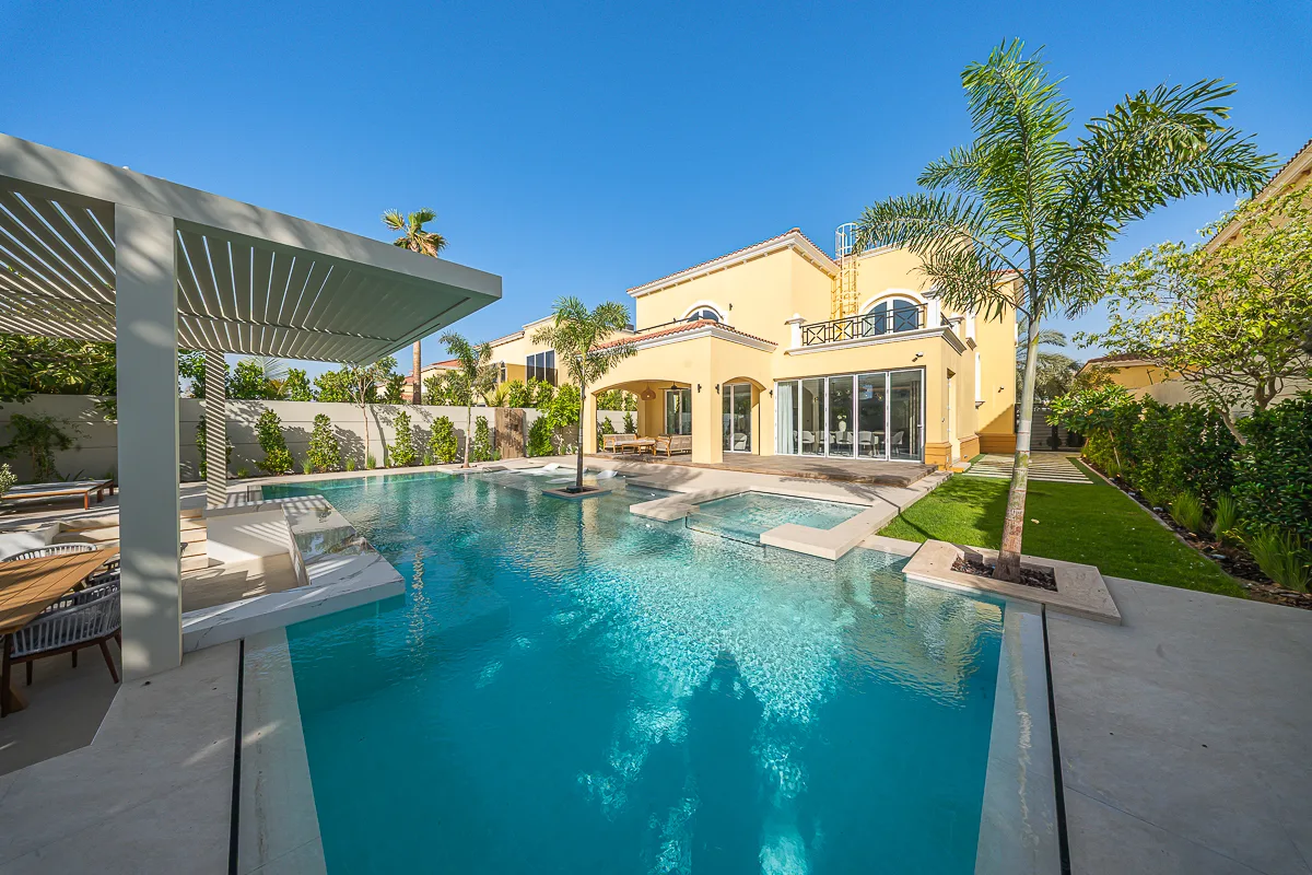Temperature-controlled pool, jacuzzi and entertainment area at Villa Sfiora