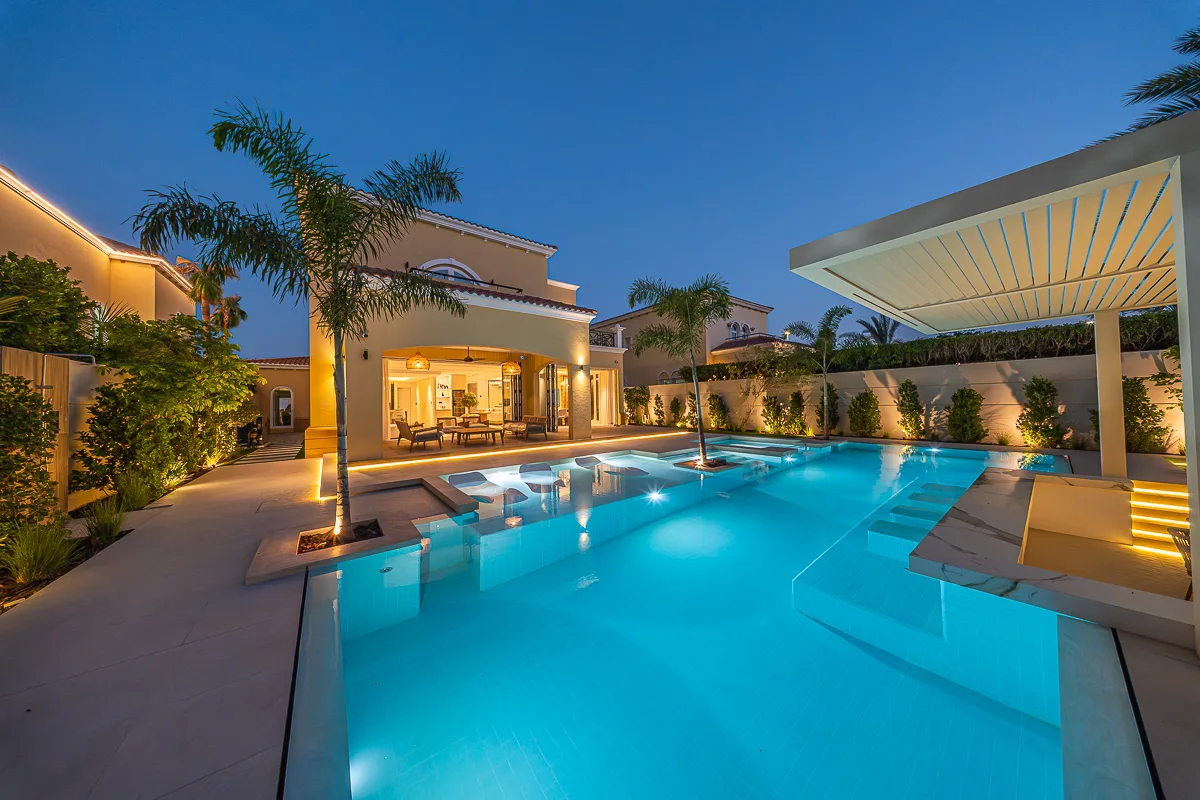 Temperature-controlled pool, jacuzzi and entertainment area at Villa Sfiora